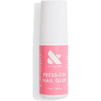 Olive and June Press On Brush On Nail Glue front view bottle
