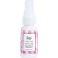 R+Co Candy Stripe Protect And Prep Detangling Spray front view bottle on white background
