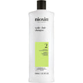 Nioxin System 2 Scalp And Hair Thickening Shampoo front view bottle showing professional hair thinning treatment label.