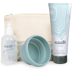 Saalt Travel Menstrual Kit front view showing travel bag and wash tube for period care.