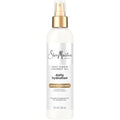 Shea Moisture 100 Percent Virgin Coconut Oil Leave-In Treatment front view bottle showcasing the packaging.